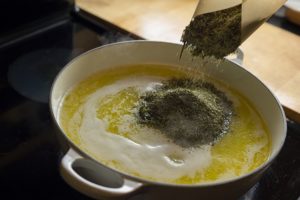 Here are seven easy steps for a great cannabutter - from the boiling of the butter/marijuana mixture to the straining and the cooling. Courtesy Bruce Wolf